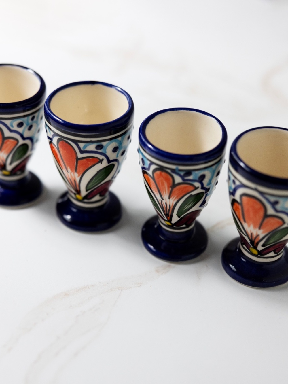Set of 4 Talavera Mexico pottery shot glasses or egg cups